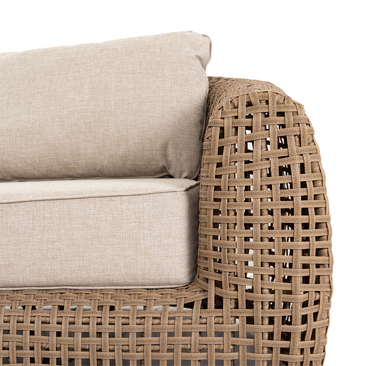 Wicker chair with beige cushions on a white background