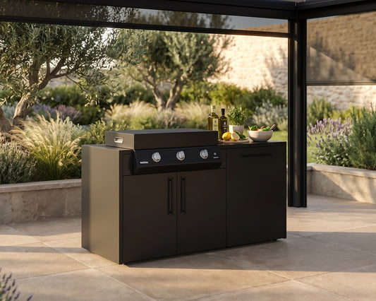Outdoor kitchen with grill and barbecue area in a garden setting
